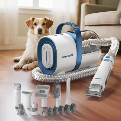 Aspirador de grooming Oneisall LM2 con accesorios para el cuidado de mascotas y un perro al fondo